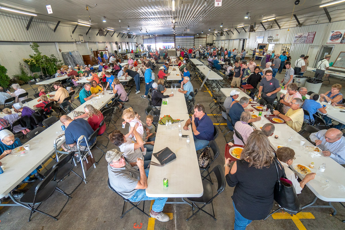 Contributors enjoying a haystack supper at the Shipshewana Auction Barn for The Farm Place fundraiser.