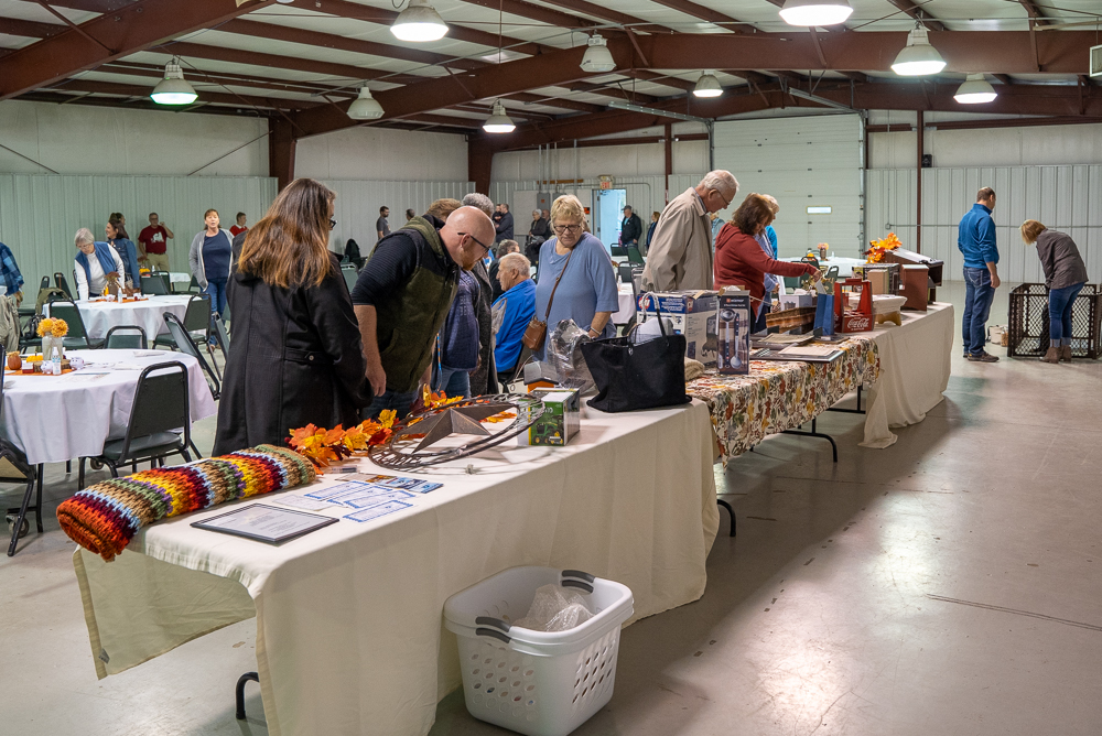Attendees looked over the auction items for The Farm Place.